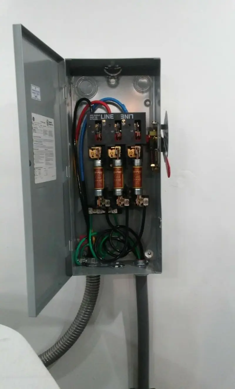 Three-phase disconnect switch installed for Smoke Detector Installation in Alden
